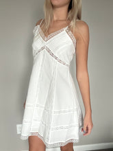 Load image into Gallery viewer, White lace nightgown held by a person against a plain background