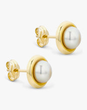 Load image into Gallery viewer, Gold earrings with white pearls on a white background