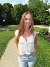 Load image into Gallery viewer, Person standing outdoors on a sunny day with trees and grass in the background