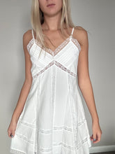 Load image into Gallery viewer, Woman wearing a white nightgown with lace details against a plain background