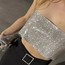 Load image into Gallery viewer, A close-up of a silver sequin crop top with straight spaghetti straps and a square neckline.