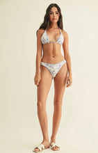 Load image into Gallery viewer, Woman wearing a floral bikini set on a plain background