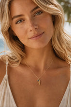 Load image into Gallery viewer, Gold Fish Charm Necklace with Blue Crystal | Coastal Layering Necklace
