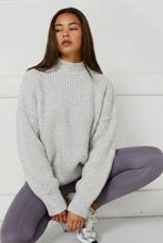 Load image into Gallery viewer, Light gray oversized chunky knit mock neck sweater with long sleeves and ribbed details, perfect for cozy fall and winter outfits.

