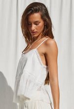 Load image into Gallery viewer, Woman wearing a white dress with thin straps against a light background
