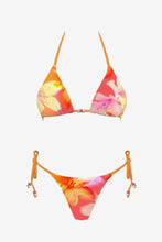 Load image into Gallery viewer, A two-piece string bikini set featuring a vibrant orange, pink, and yellow floral print, displayed against a solid light gray background.
