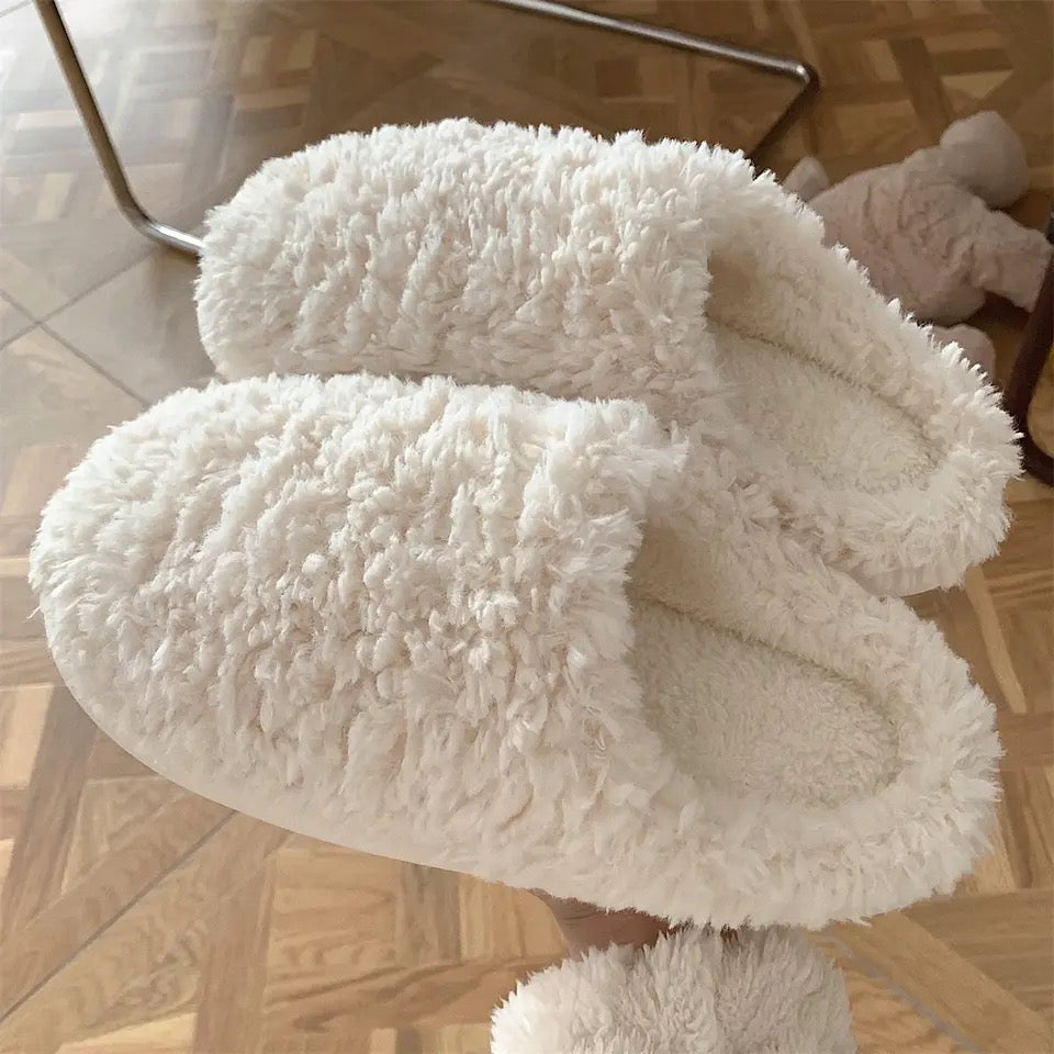 Fluffy white slippers