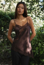 Load image into Gallery viewer, Woman wearing a brown lace nightgown outdoors with greenery in the background
